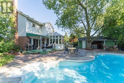 690 Robertson Crescent, Milton (Tm Timberlea), ON - Outdoor With In Ground Pool With Deck Patio Veranda