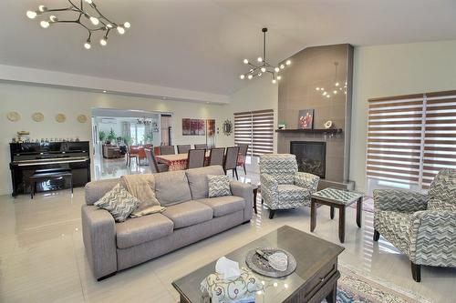 Living room - 402 Route Des Pionniers, Rouyn-Noranda, QC - Indoor Photo Showing Living Room With Fireplace