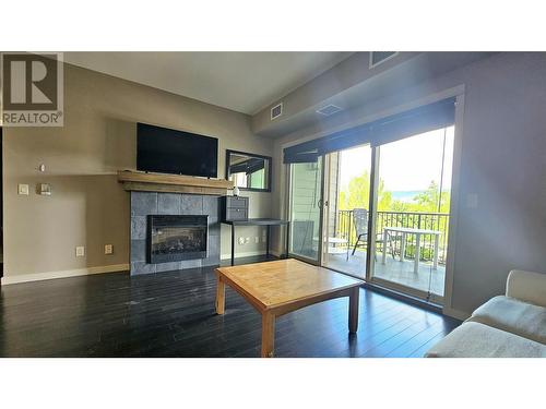 2142 Vasile Road Unit# 314, Kelowna, BC - Indoor Photo Showing Living Room With Fireplace