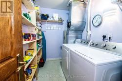 in suite laundry with ample storage - 