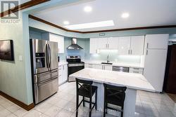 updated kitchen with quartz counters - 