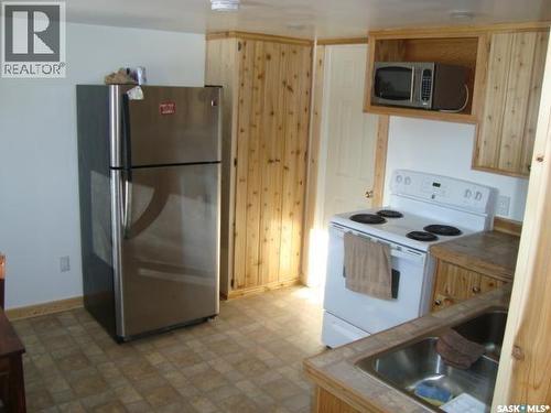 48 Main Street, Manor, SK - Indoor Photo Showing Kitchen With Double Sink