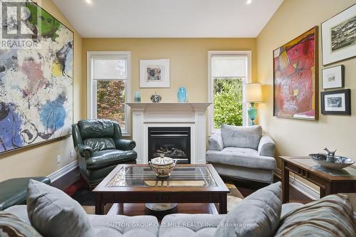 51 - 18 Crimson Drive, Niagara-On-The-Lake, ON - Indoor Photo Showing Living Room With Fireplace