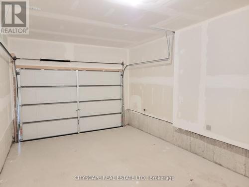 Garage - 7 Fennell Street, Southgate, ON - Indoor Photo Showing Garage