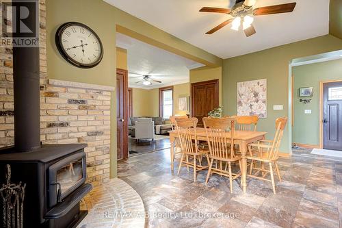 6355 Perth Rd 55 Line, West Perth (Logan), ON - Indoor Photo Showing Dining Room With Fireplace