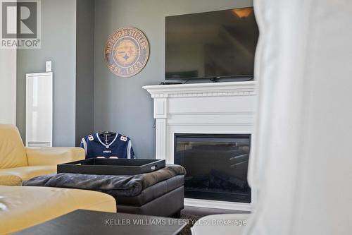 1004 - 1030 Coronation Drive, London North (North I), ON - Indoor Photo Showing Living Room With Fireplace