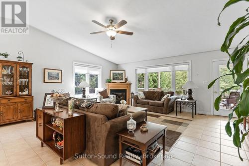 1215 Sunset Drive, South Bruce Peninsula, ON - Indoor Photo Showing Living Room With Fireplace