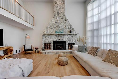 Living room - 1080 Rue Ste-Thérèse, Saint-Jean-Sur-Richelieu, QC - Indoor Photo Showing Living Room With Fireplace