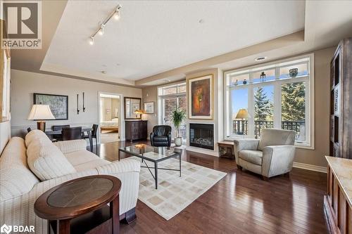 71 Bayberry Drive Unit# 212, Guelph, ON - Indoor Photo Showing Living Room With Fireplace