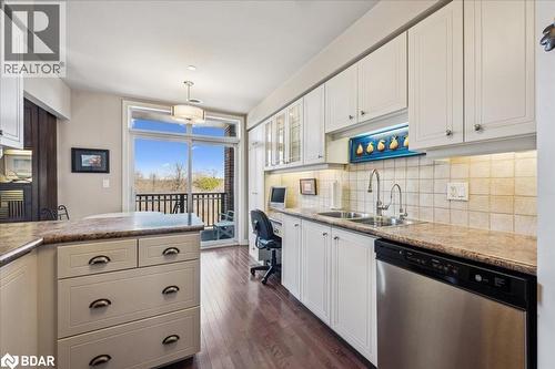 71 Bayberry Drive Unit# 212, Guelph, ON - Indoor Photo Showing Kitchen With Double Sink