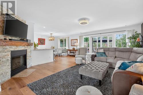 141 Bayshore Drive, Ramara, ON - Indoor Photo Showing Living Room With Fireplace