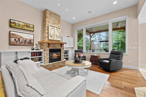 5100 Haynes Road, Vernon, BC - Indoor Photo Showing Living Room With Fireplace