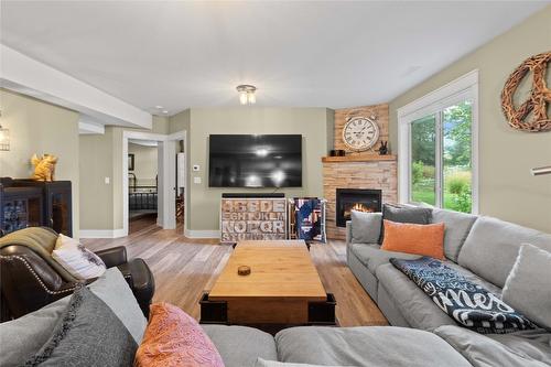 5100 Haynes Road, Vernon, BC - Indoor Photo Showing Living Room With Fireplace
