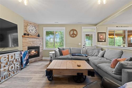 5100 Haynes Road, Vernon, BC - Indoor Photo Showing Living Room With Fireplace