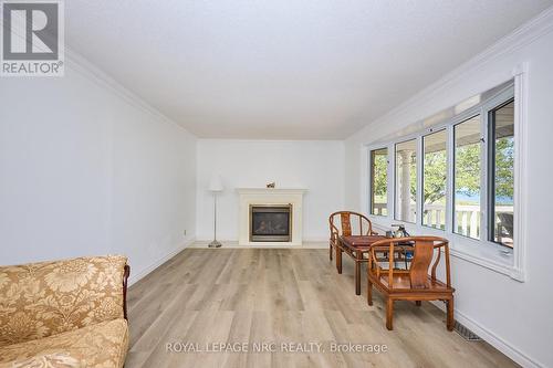 Propane fireplace - 4040 Lakeshore Road, Lincoln (Lincoln Lake), ON - Indoor Photo Showing Living Room With Fireplace