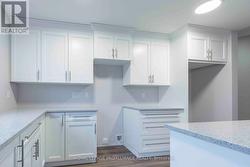 Photos are of a completed end unit - 