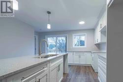 Photos are of a completed end unit - 