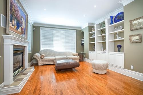 Salon - 4 Rue Edgewood, Dollard-Des-Ormeaux, QC - Indoor Photo Showing Living Room With Fireplace