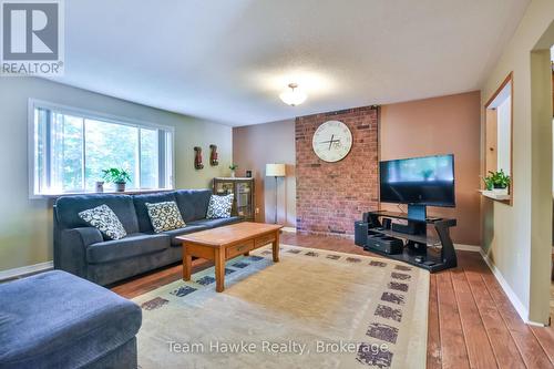 40 St. Laurent Boulevard, Tiny, ON - Indoor Photo Showing Living Room With Fireplace