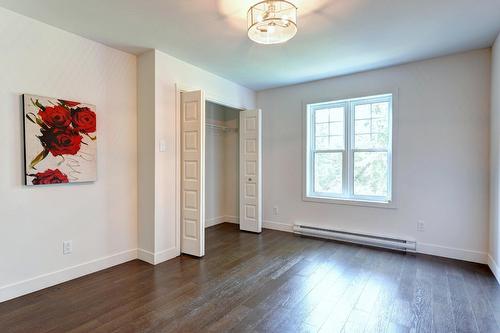 Chambre à coucher principale - 1050 Ch. Ste-Marie, Mascouche, QC - Indoor Photo Showing Other Room