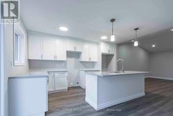 Photos are of a completed end unit - 