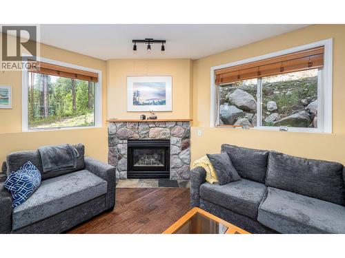 225 Kettleview Road Unit# 102, Big White, BC - Indoor Photo Showing Living Room With Fireplace
