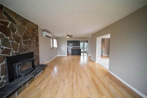 920 22Nd Avenue, Cranbrook, BC - Indoor Photo Showing Living Room With Fireplace