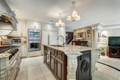 Cuisine - 1185 Rue Tecumseh, Dollard-Des-Ormeaux, QC - Indoor Photo Showing Kitchen With Upgraded Kitchen