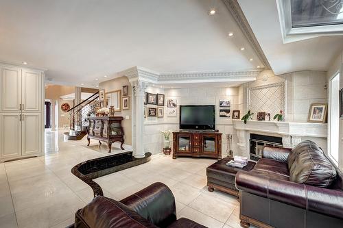 Salon - 1185 Rue Tecumseh, Dollard-Des-Ormeaux, QC - Indoor With Fireplace