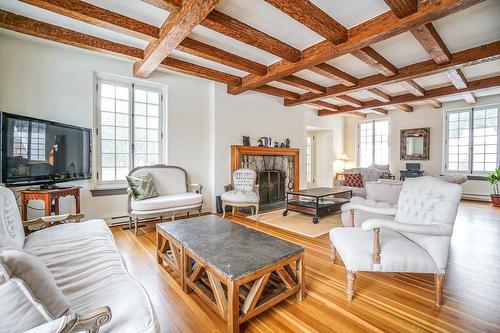 Living room - 1 Ch. De La Montagne, Saint-André-D'Argenteuil, QC - Indoor Photo Showing Living Room With Fireplace