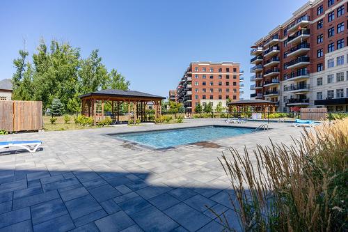 Piscine - 109-9175 Rue Lennon, Brossard, QC - Outdoor With In Ground Pool
