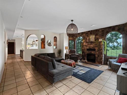 3211 Mcdonald Avenue, Brandon, MB - Indoor Photo Showing Other Room With Fireplace