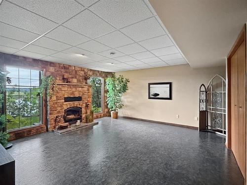 3211 Mcdonald Avenue, Brandon, MB - Indoor With Fireplace