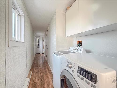 99 Curtis Road S, Brandon, MB - Indoor Photo Showing Laundry Room