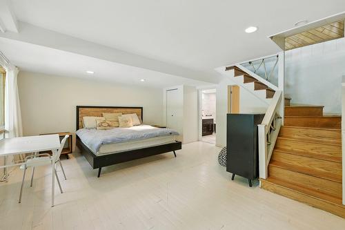 Family room - 3 Place D'Artois, Estérel, QC - Indoor Photo Showing Bedroom