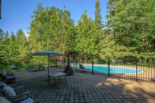 Patio - 3 Place D'Artois, Estérel, QC - Outdoor With In Ground Pool