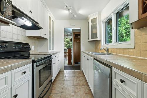 Kitchen - 3 Place D'Artois, Estérel, QC - Indoor Photo Showing Kitchen With Double Sink