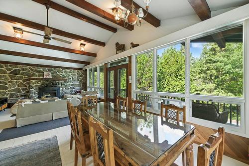 Dining room - 3 Place D'Artois, Estérel, QC - Indoor With Fireplace