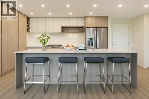 *Virtually Staged - 2780 Olalla Road Unit# 208, West Kelowna, BC - Indoor Photo Showing Kitchen With Stainless Steel Kitchen With Upgraded Kitchen
