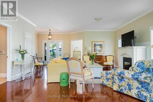 Open and airy living room - 77 Findlay Drive, Collingwood, ON - Indoor Photo Showing Other Room With Fireplace