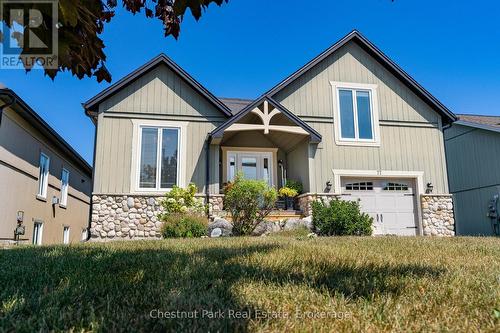 Raised bungalow with oversized single garage - 77 Findlay Drive, Collingwood, ON - Outdoor With Facade