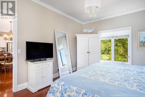 Primary bedroom with views to the back yard - 77 Findlay Drive, Collingwood, ON - Indoor Photo Showing Bedroom