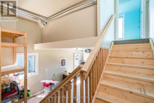 Garage with access to the bonus room above garage - 77 Findlay Drive, Collingwood, ON - Indoor Photo Showing Other Room