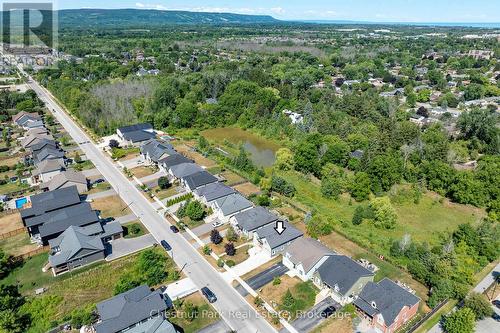 Aerial view showing greenspace & storm pond - 77 Findlay Drive, Collingwood, ON - Outdoor With View