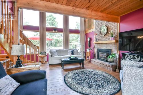 135 Bayshore Drive, Ramara, ON - Indoor Photo Showing Living Room With Fireplace