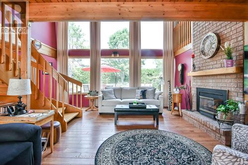 135 Bayshore Drive, Ramara, ON - Indoor Photo Showing Living Room With Fireplace
