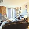 407D 802 Kingsmere Boulevard, Saskatoon, SK  - Indoor Photo Showing Living Room 