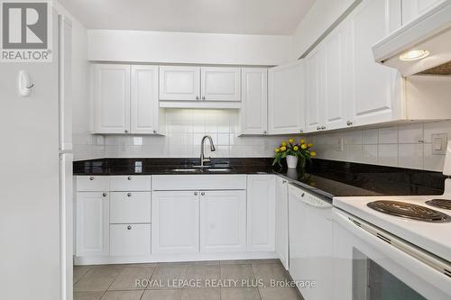 712 - 50 Kingsbridge Garden Circle, Mississauga, ON - Indoor Photo Showing Kitchen With Double Sink