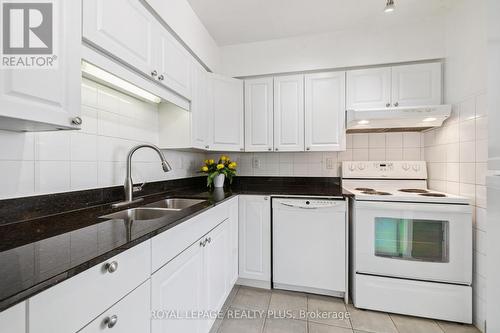 712 - 50 Kingsbridge Garden Circle, Mississauga, ON - Indoor Photo Showing Kitchen With Double Sink