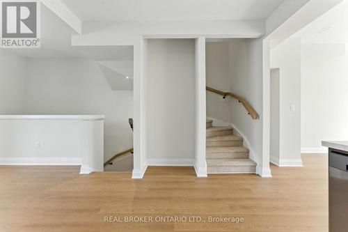 Modern wood pickets with oak  handrails - Unit 3 - 161 Fifth Avenue, Brant, ON - Indoor Photo Showing Other Room